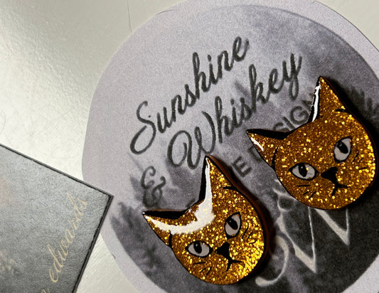 Fleur studs- orange glitter